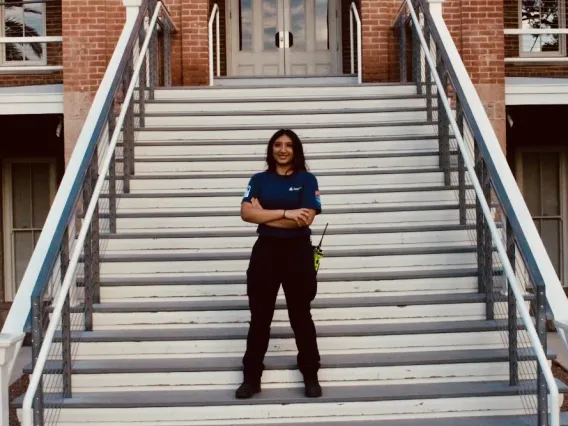 Delilah in front of stairs