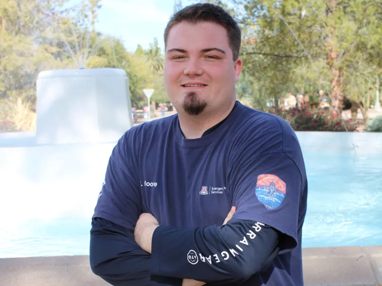 John in front of fountain