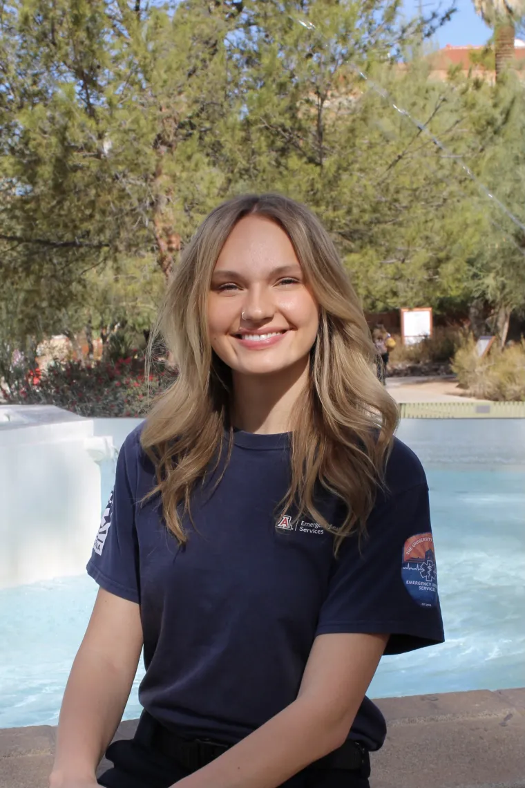 Jadyn in front of fountain