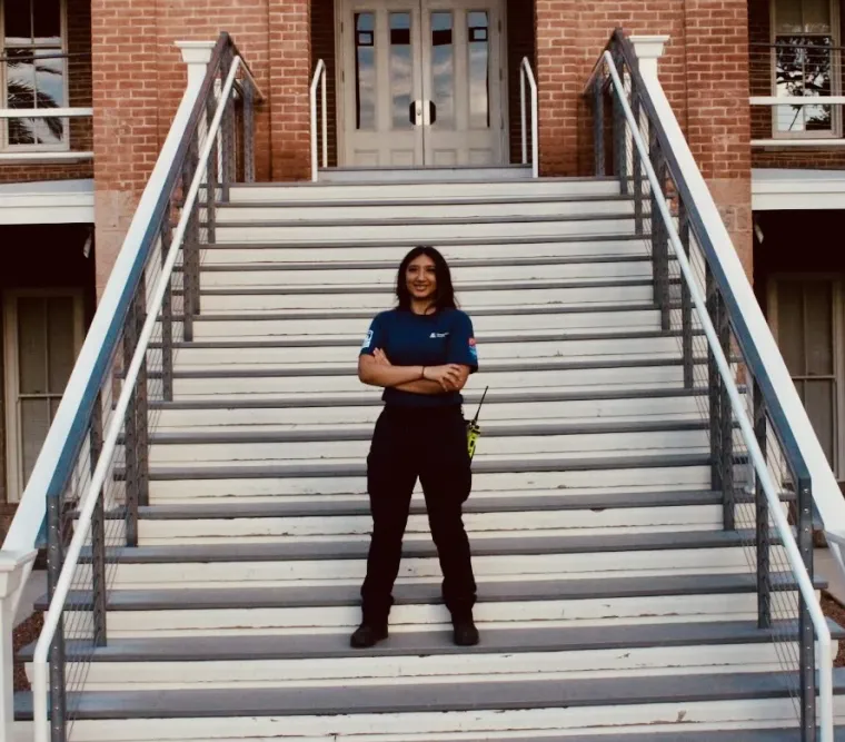 Delilah in front of stairs